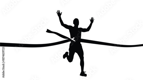 Silhouette of triumphant runner celebrating victory while breaking through the finish line tape