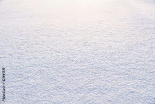 Pristine winter snow texture covering frozen ground