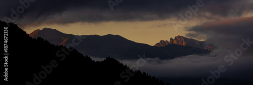 beautiful evening mountains in dusk panorama