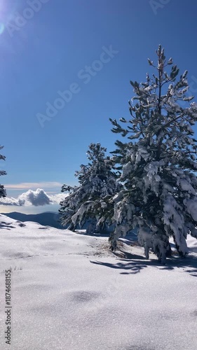 Pristine winter mountain views reveal snow-covered peaks and untouched alpine landscapes in the Sierra Nevada, Spain.