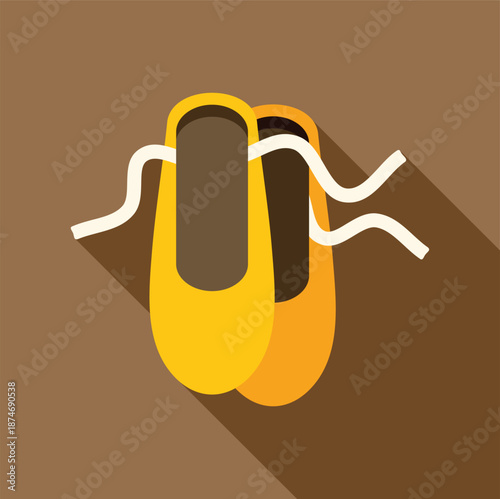 Yellow pointe shoes with ribbons representing ballet, dance, and elegance