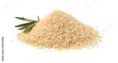 Foto Pile of granulated dried garlic with rosemary isolated on white