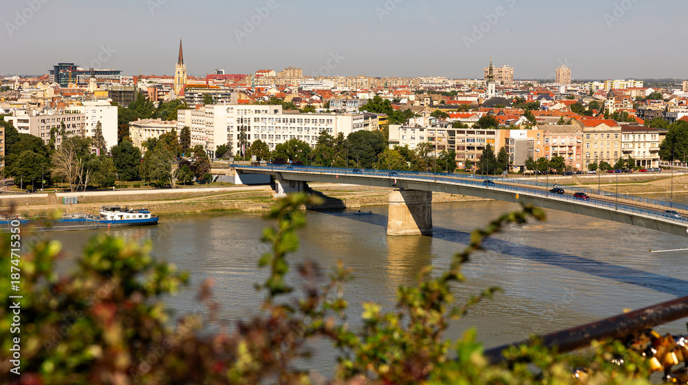 Obraz premium Captivating panorama of Novi Sad. Serbia. Where the majestic Danube River flows beneath a picturesque skyline