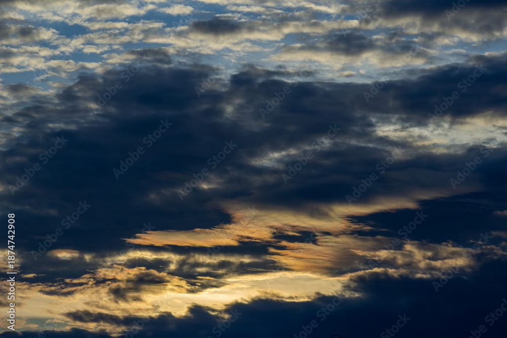 Obraz premium Cloudscape, Colored Clouds at Sunset near the Ocean in a Tropical Climate in Venezuela
