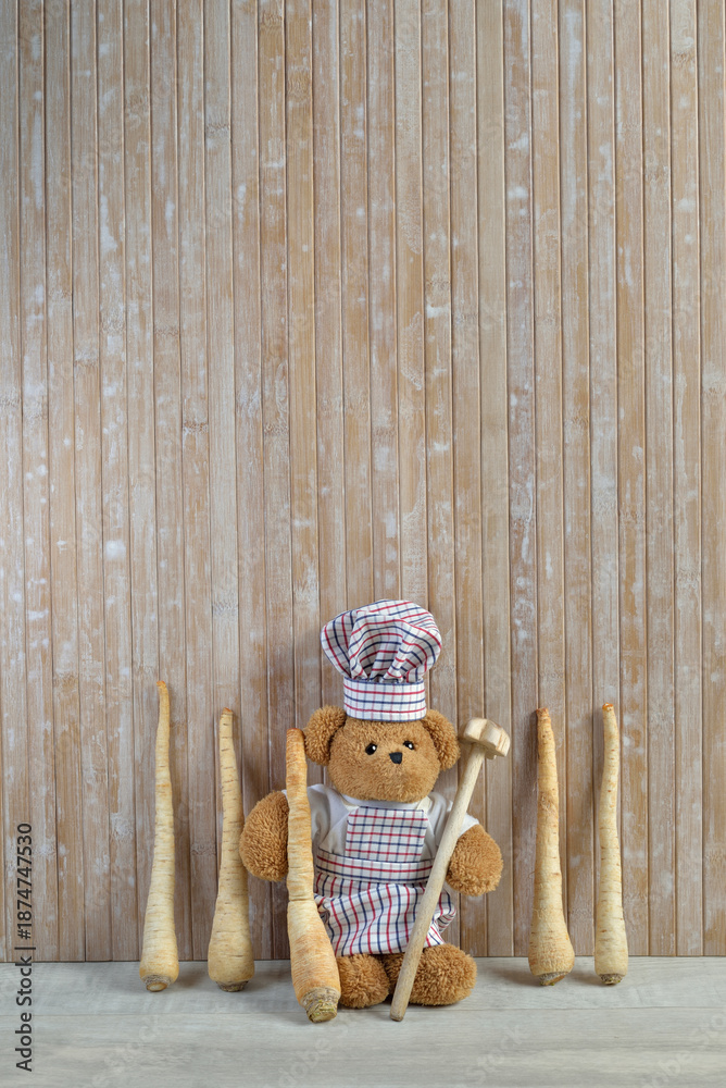 Fotografie Teddy bear Chef cook Parsley roots