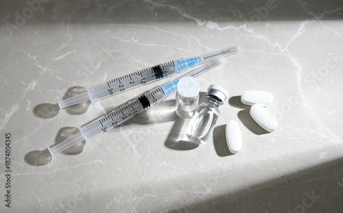 Glass Vials Peptide Compounds and Single Use Syringes Next to Weight Loss Pills