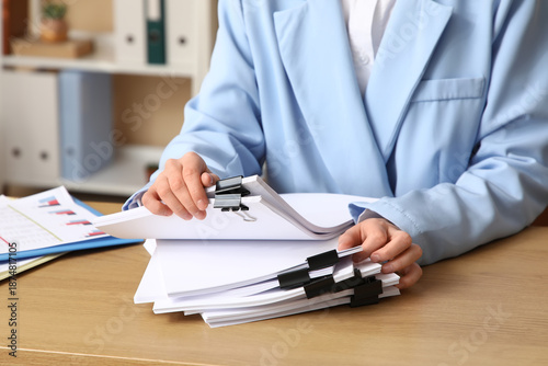 Businesswoman searching thr...