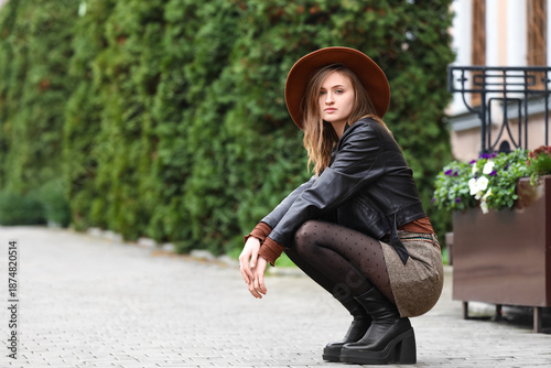 Stylish young woman wearing...