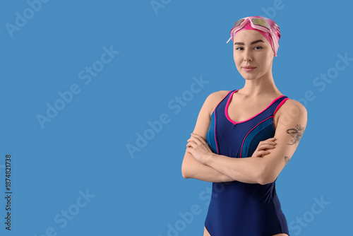 Female swimmer on blue back...