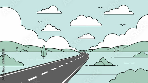 Winding road in a serene countryside landscape with greenery and blue sky