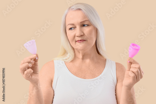 Thoughtful mature woman wit...