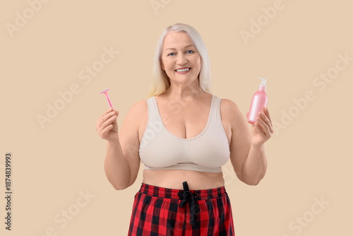 Mature woman with razor and...