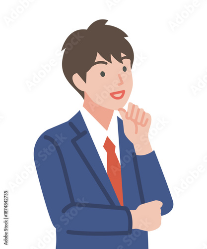 腕組みをする制服を着た男子学生