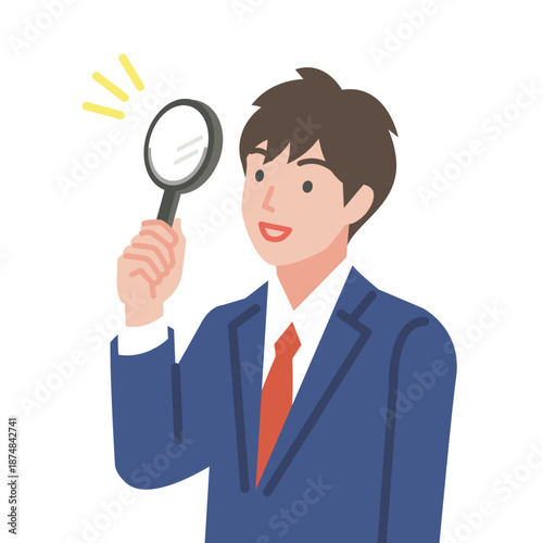 虫眼鏡を持つ男子学生