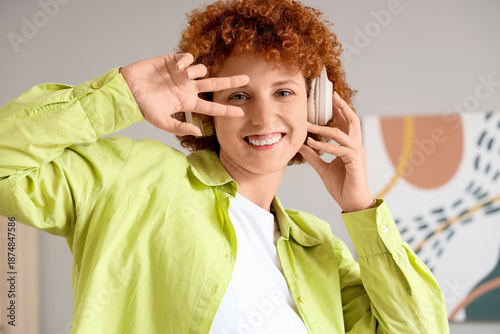 Young redhead woman in head...