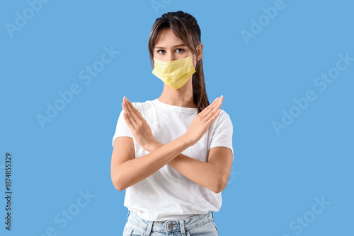 Young woman in medical mask...