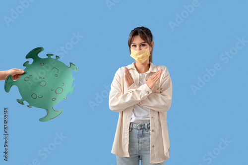 Young woman in medical mask...