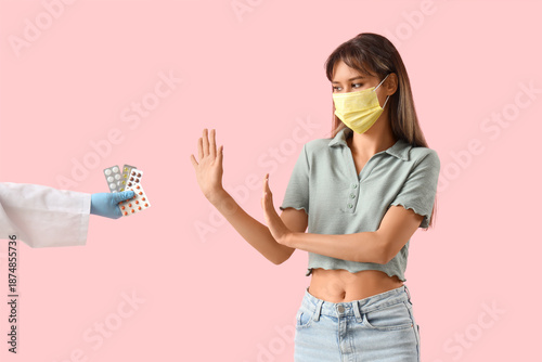 Young woman in medical mask...