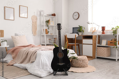 Interior of light bedroom w...