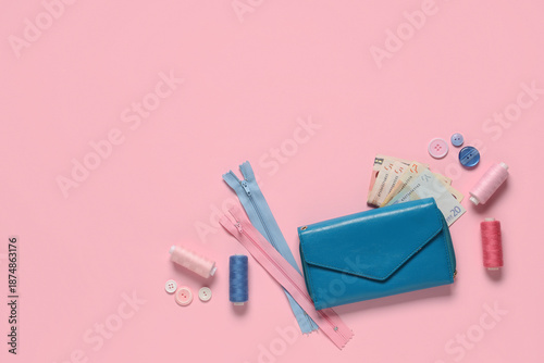 Wallet with money and tailo...