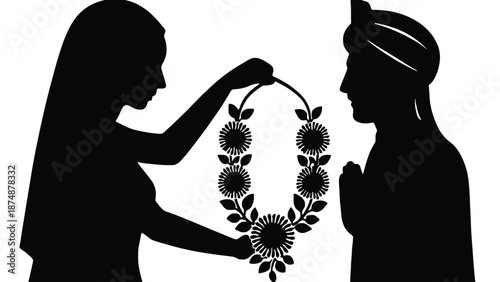 A couple in love holding a floral heart silhouette together happily