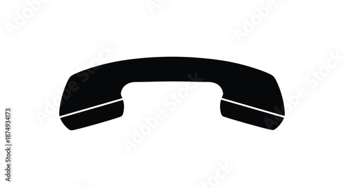 A simple black telephone handset receiver against a white background a striking silhouette