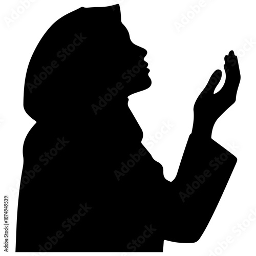 Silhouette of a Muslim Woman in Prayer.