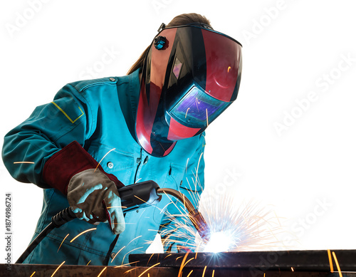 Welder in red and black helmet, teal protective jacket, and thick red gloves, actively performing arc welding on, isolated on transparent background