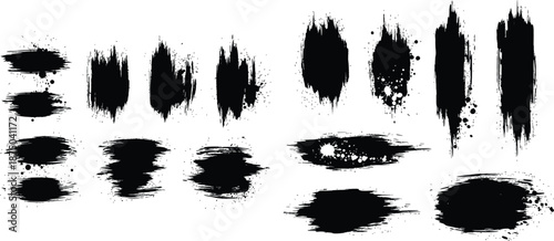 set of varied rough brush strokes with splash effects on white background