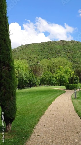 Handheld POV Walking Through a Beautiful Park Path in Avène, France