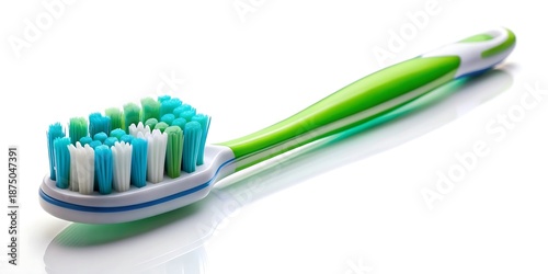 Green and white toothbrush with blue bristles