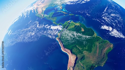 A high-angle view of Earth highlighting Central & South America, oceans, continents, clouds, and bright blue sky