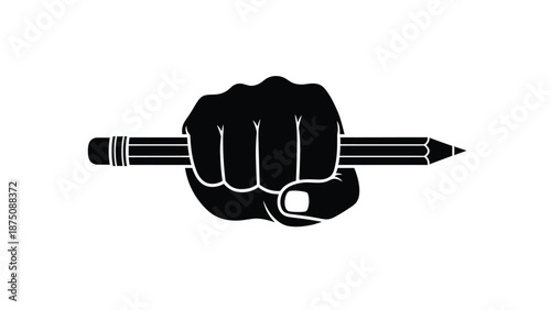a black fist holding a pencil in a powerful grip