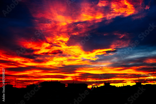 Photos Tramonto su tetti cittadini