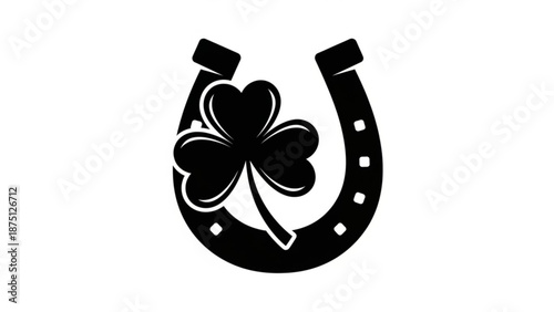 A black horseshoe with a four-leaf clover on a white background