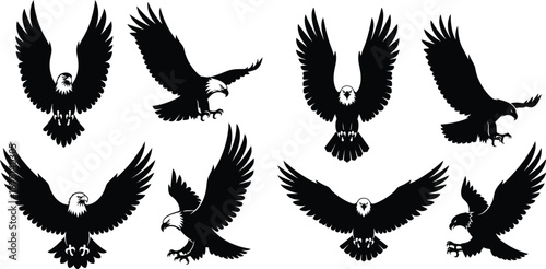 Powerful black silhouettes of eagles in flight and landing poses with outstretched wings, showcasing strength