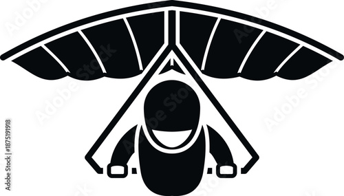 Hang glider silhouette flying through the air, enjoying adventure and freedom