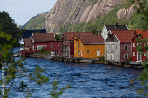 Historical wooden houses in a sleepy village by the river. Summer, Sireåna (Sireåna), Agder, Norway.