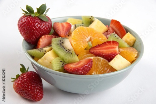 Fresh Fruit Salad in a Bowl Isolated on White Background