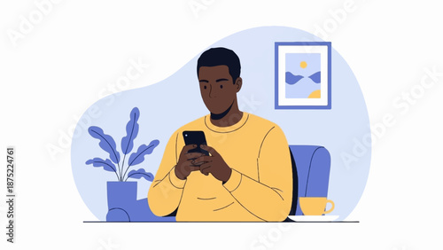 A person sits in a blue chair, engrossed in their phone, with a plant and artwork nearby