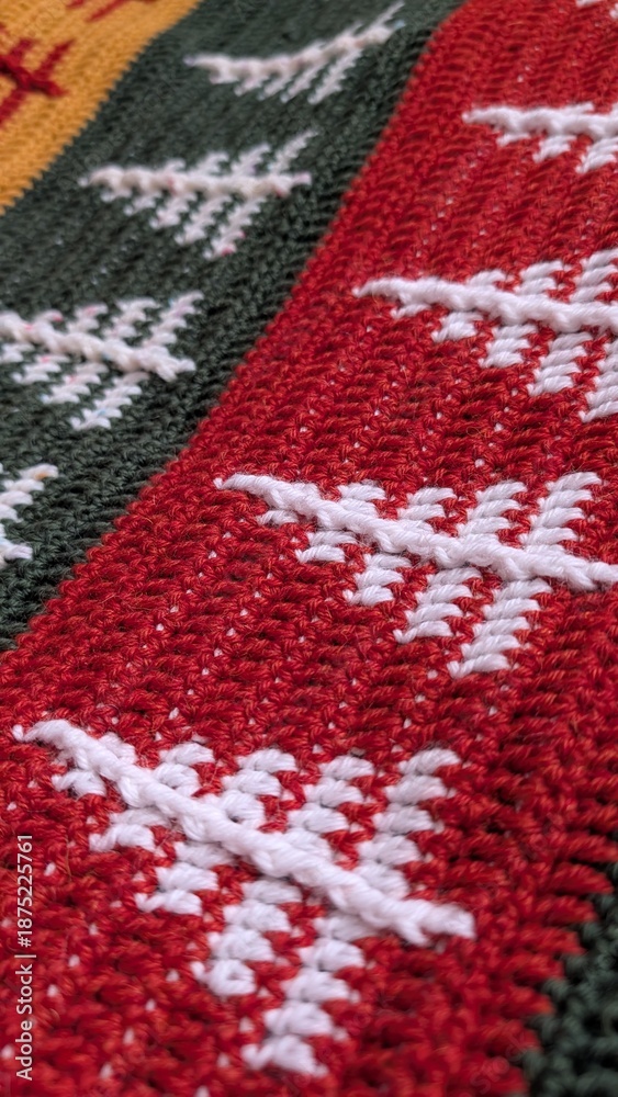 Fototapeta premium Close up of red, white and green crochet pattern