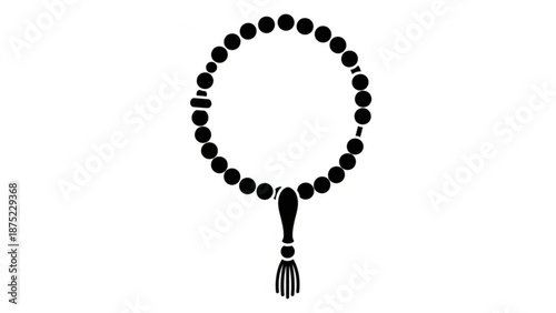A black rosary hangs in a circular shape against a white background
