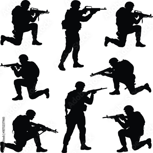 Silhouettes of soldiers in combat poses with rifles