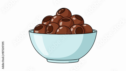 A light blue bowl brimming with dark brown, round treats, each with a darker, circular indent