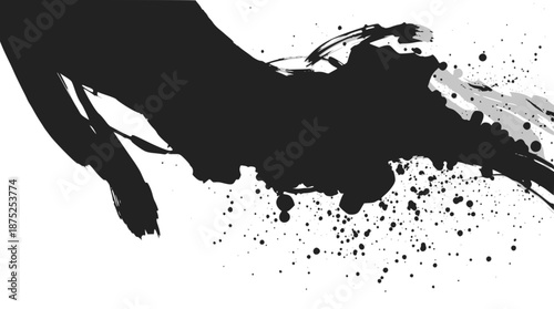 Abstract black and white explosion with sharp shards and ink splatters on a white background.