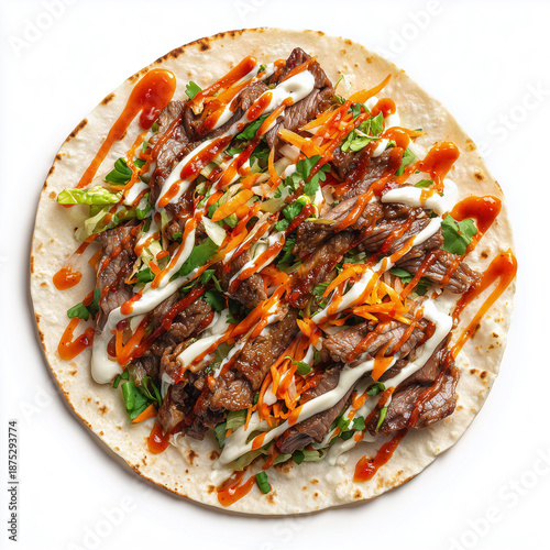 Top-view Korean BBQ beef taco: tortilla opened flat, toppings arranged radial-style, gochujang drizzle visible