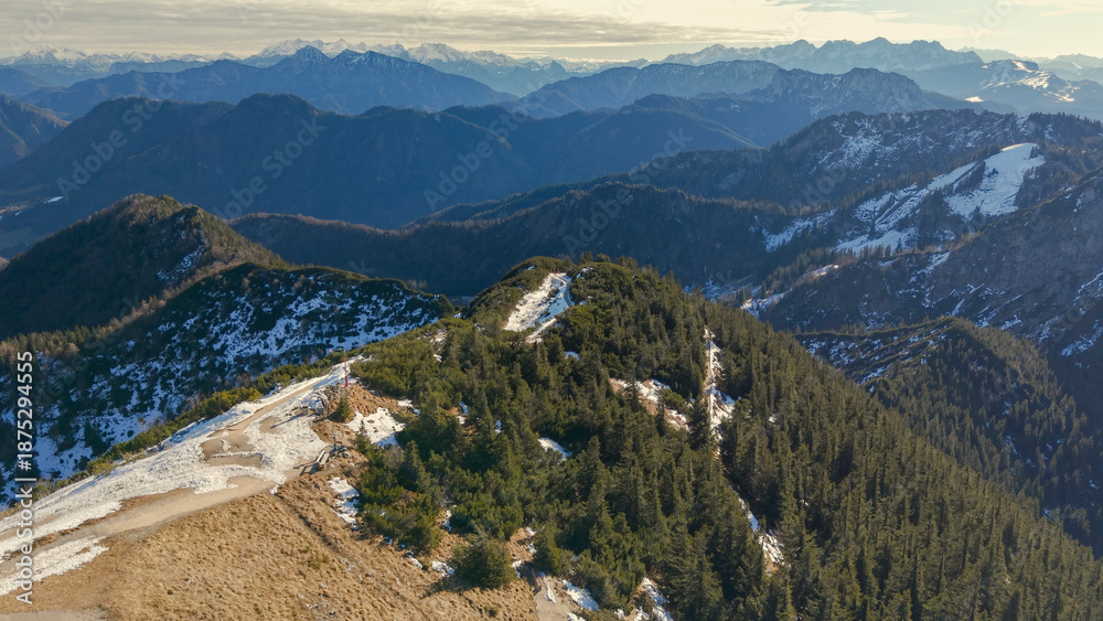Naklejka premium Chiemgau mountain valley landscape close to the Hochfelln peak during winter and autumn season