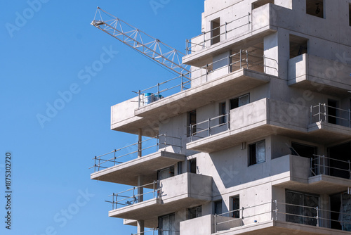 construction crane building architecture urban development property concrete scaffold montpellier France view of crane jib above new district planning