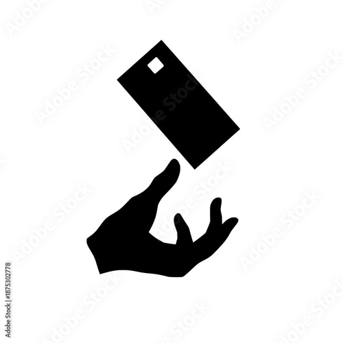 Hand Reaching to Catch a Falling Rectangular Object in a Simple Design During a Bright Day