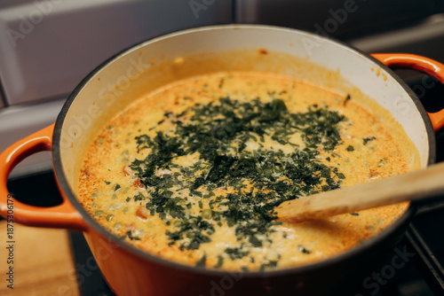 Adding parsley to a dish. © erika8213